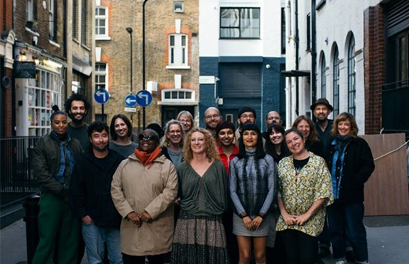 Group smiling in the street