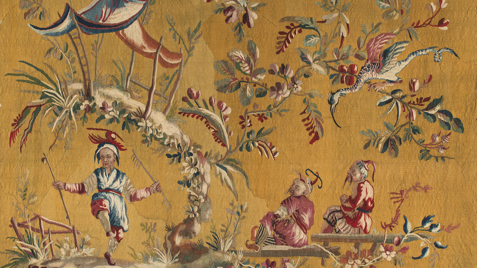 «O Dançarino». Manufatura de Aubusson sobre cartões de Jean Pillement, França, século XVIII. Lã e seda. Uma das sete tapeçarias da armação «Chinoiserie» que decoravam o «boudoir». Museu Calouste Gulbenkian.