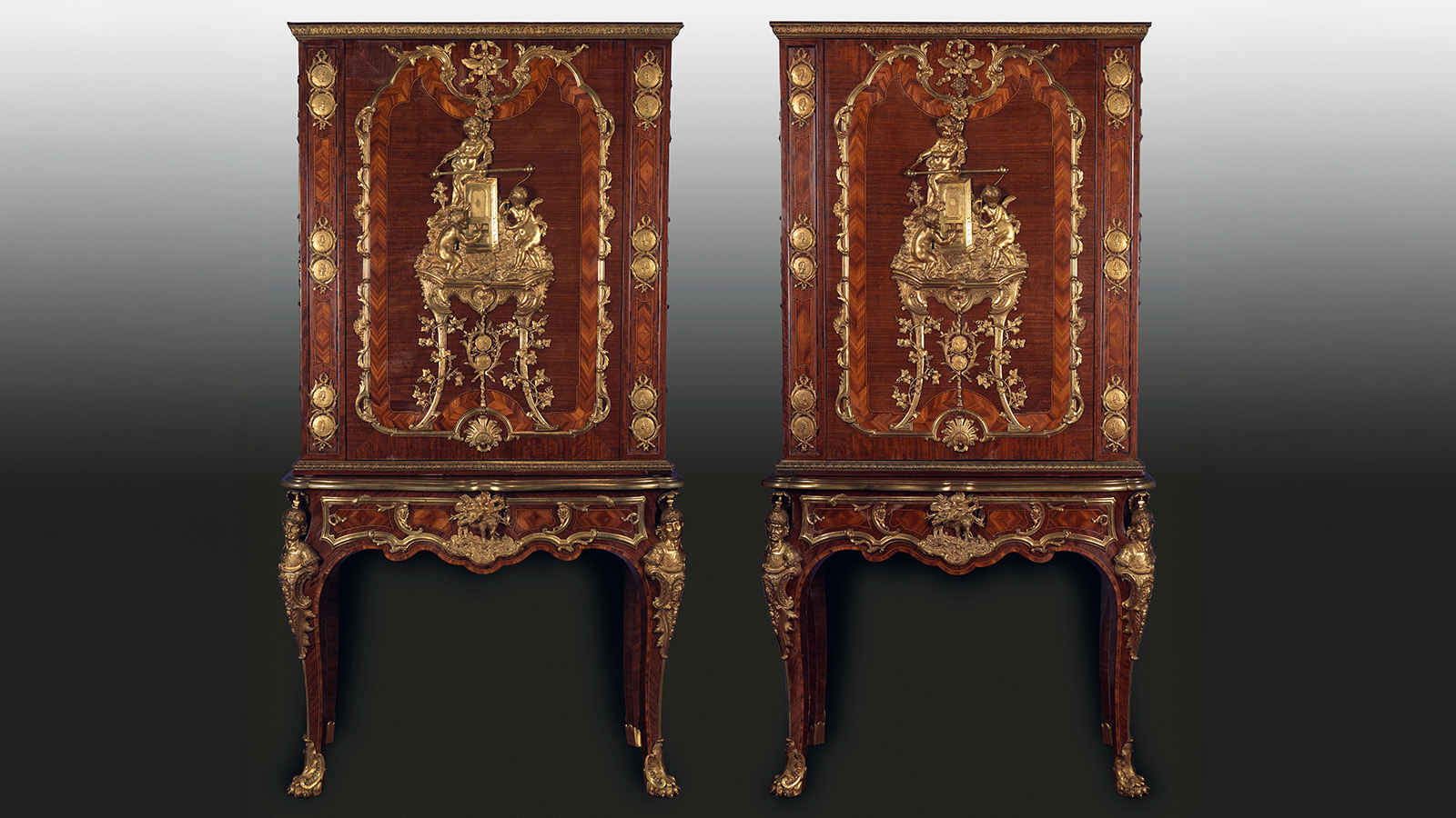Charles Cressent, Pair of Medal Cabinets. France, c. 1750. Structure in oak veneered with satinwood, amaranth, boxwood, and ebony; chased and gilded bronze. Calouste Gulbenkian Museum, inv. 2368A/B.